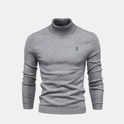 Camisola de lã de malha entrançada com gola alta