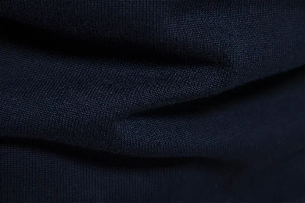 BURK QUARTER ZIP SWEATER