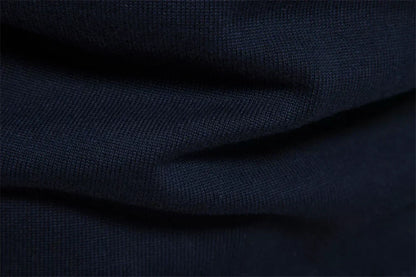 BURK QUARTER ZIP SWEATER